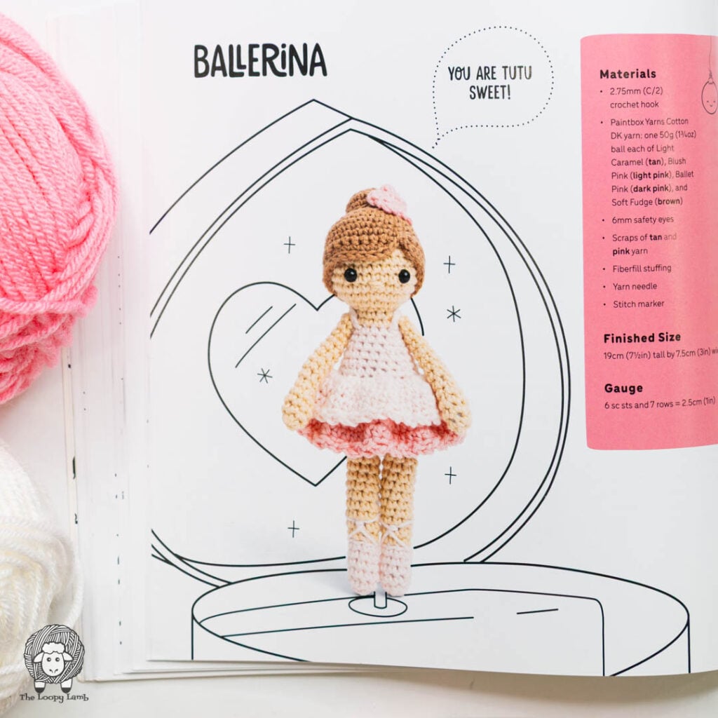 ccrochet ballerina pictured on a open jewlery box that is sketched as the background