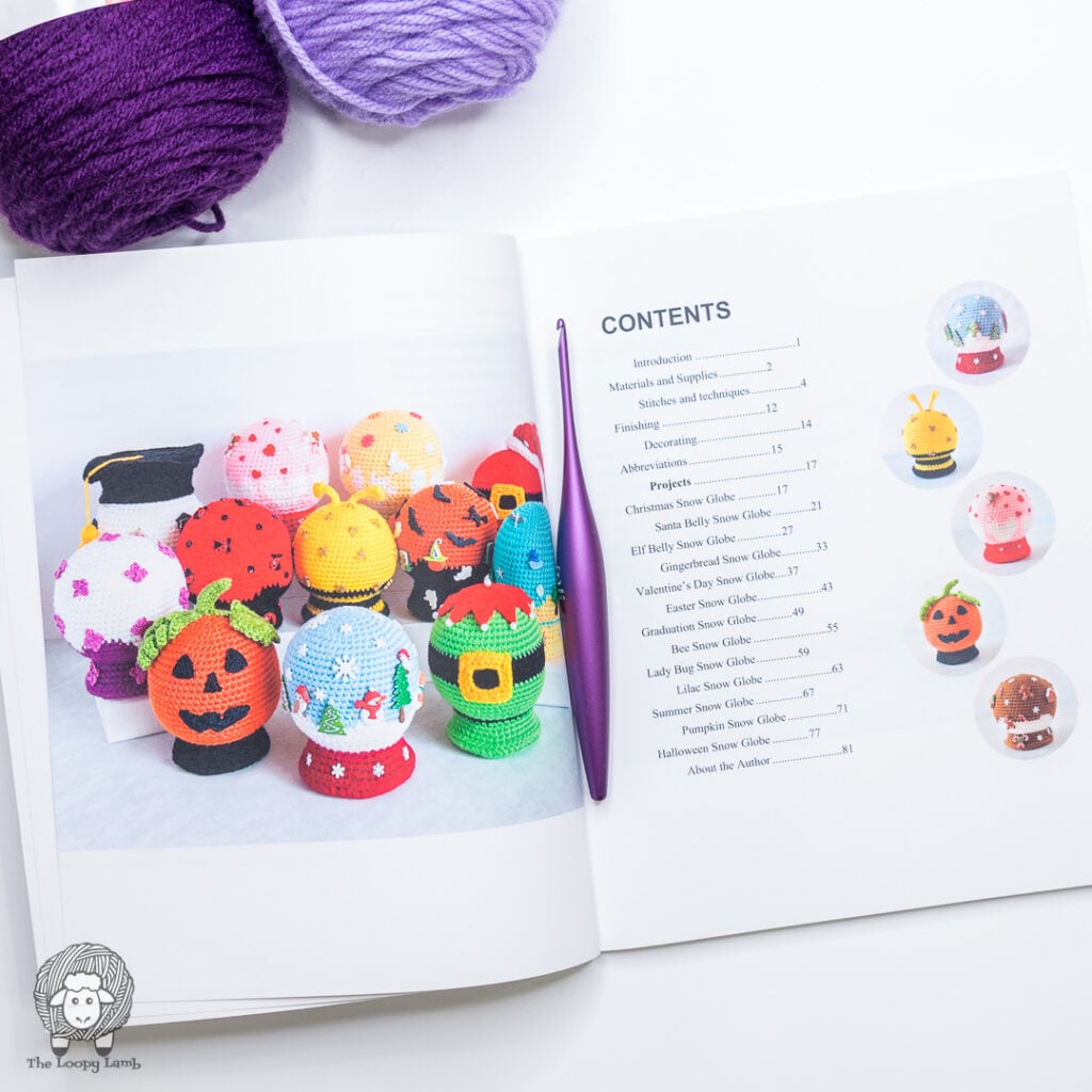 book open to show a collection of amigurumi snow globes and the book's table of contents