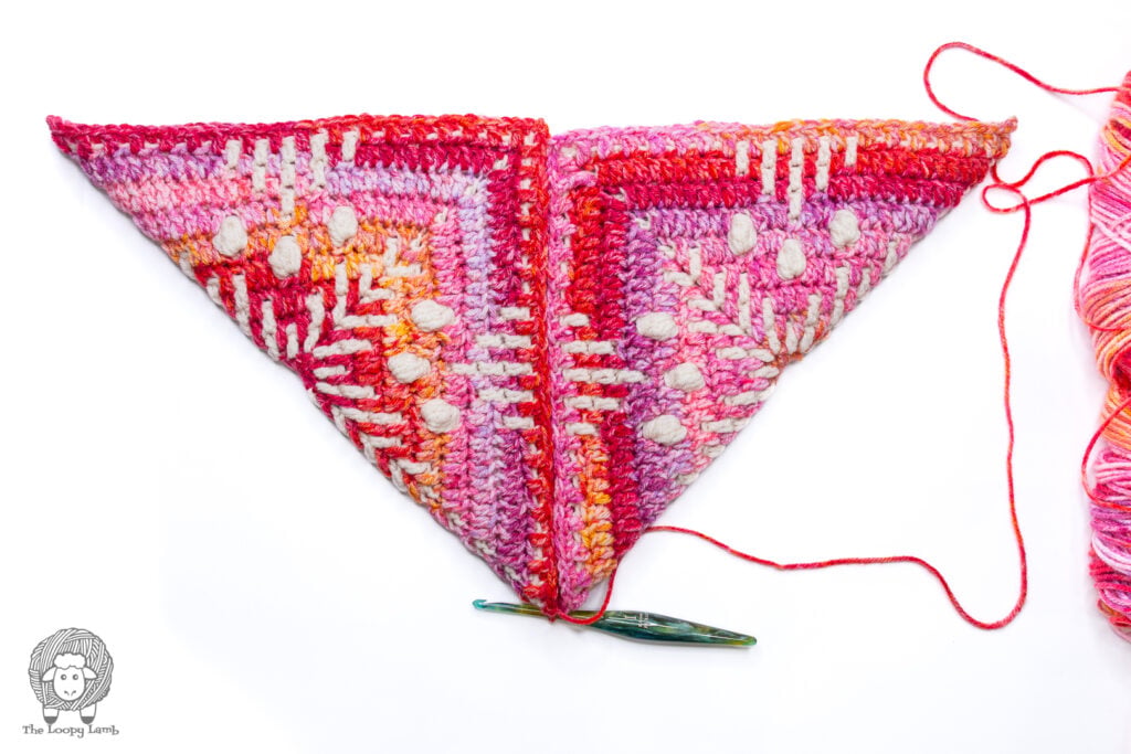 continuing the seam on the other side of the folded granny squares