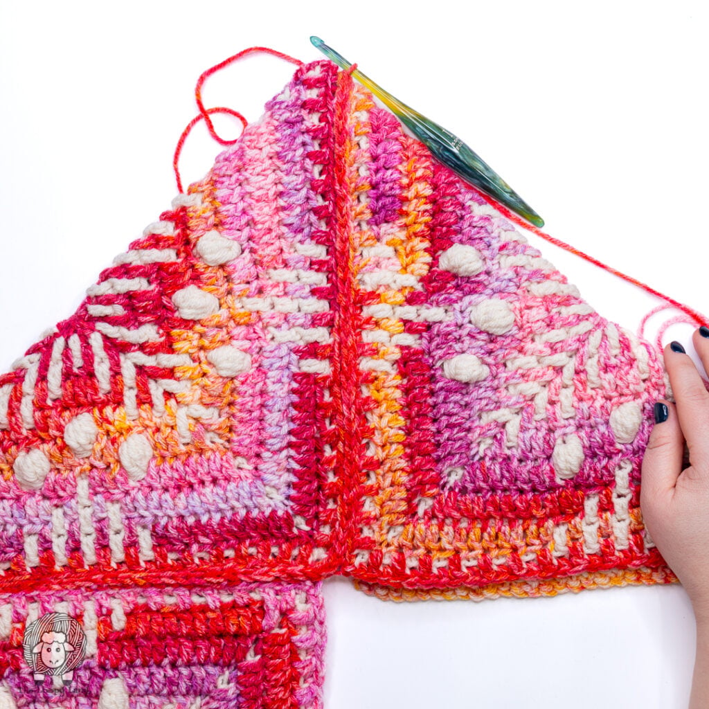 slip stitch seam done to the next corner on the assembled granny squares