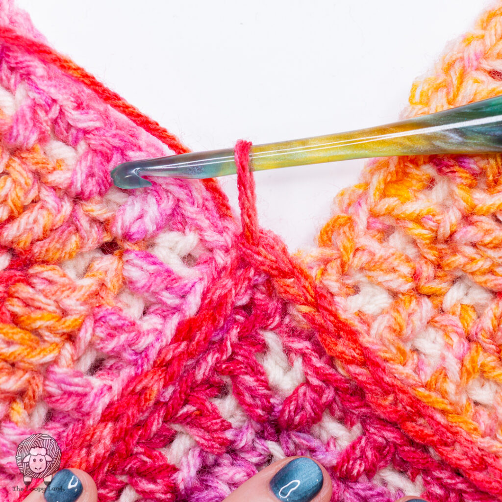 Joining granny squares at the center point where all squares meet
