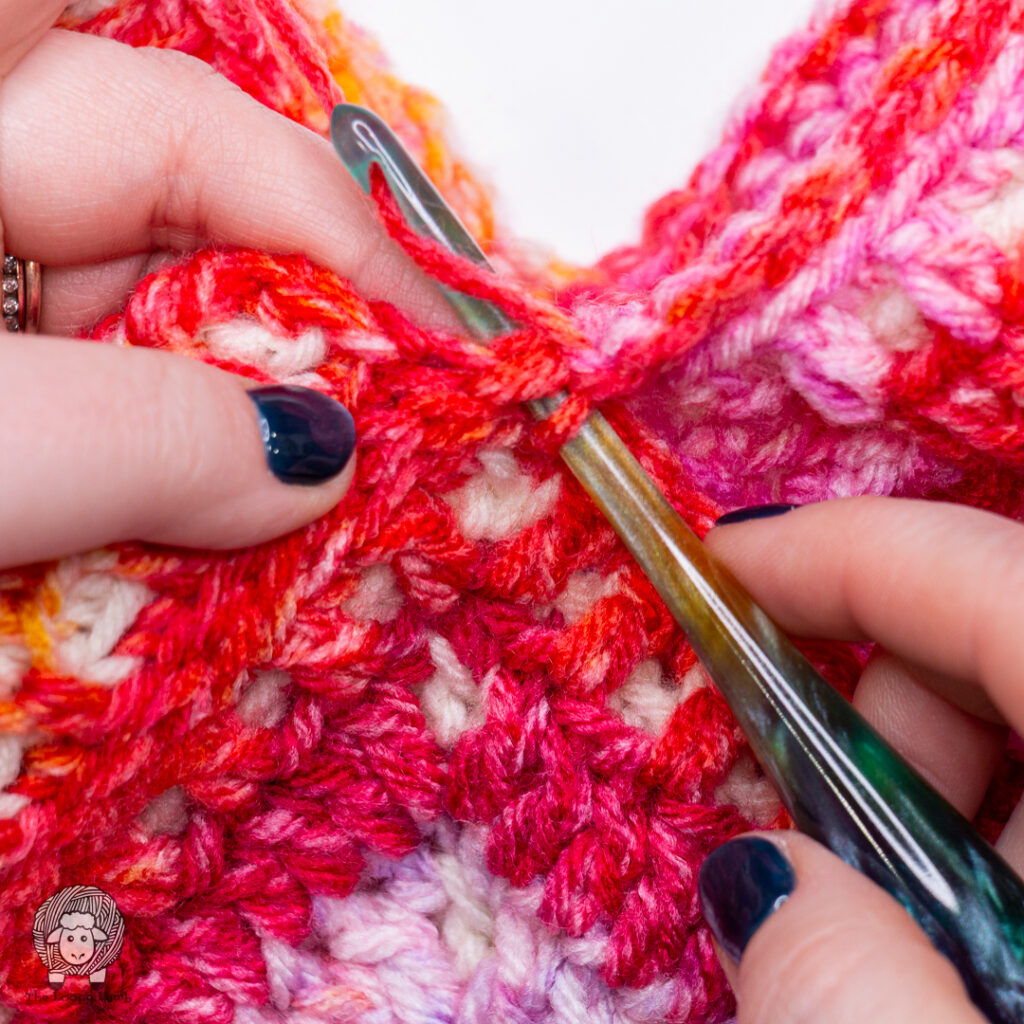 joining granny squares at the center point on the opposite side of the bag