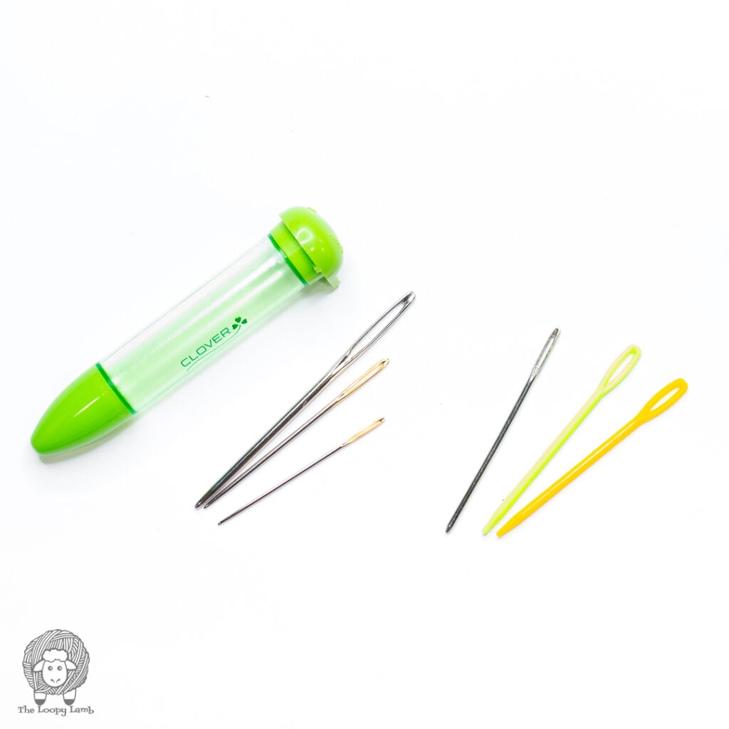essential crochet tools for beginners: tapestry needles - shown on a white background