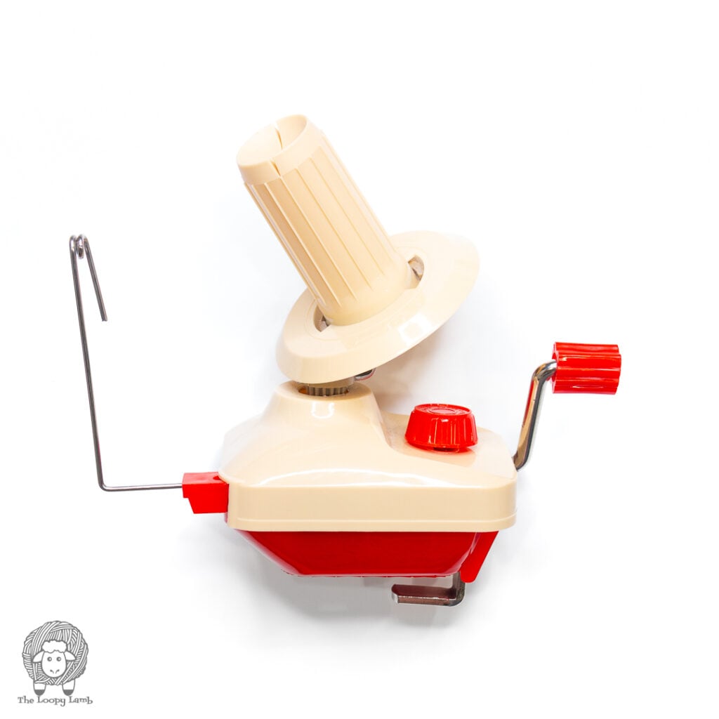 crochet tools: standard yarn winder on a white background