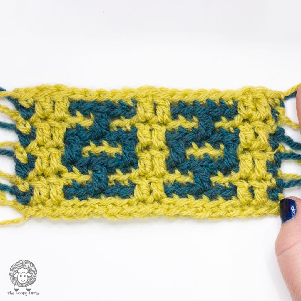 Overlay mosaic crochet swatch showing rows 1 - 9 of the provided chart completed